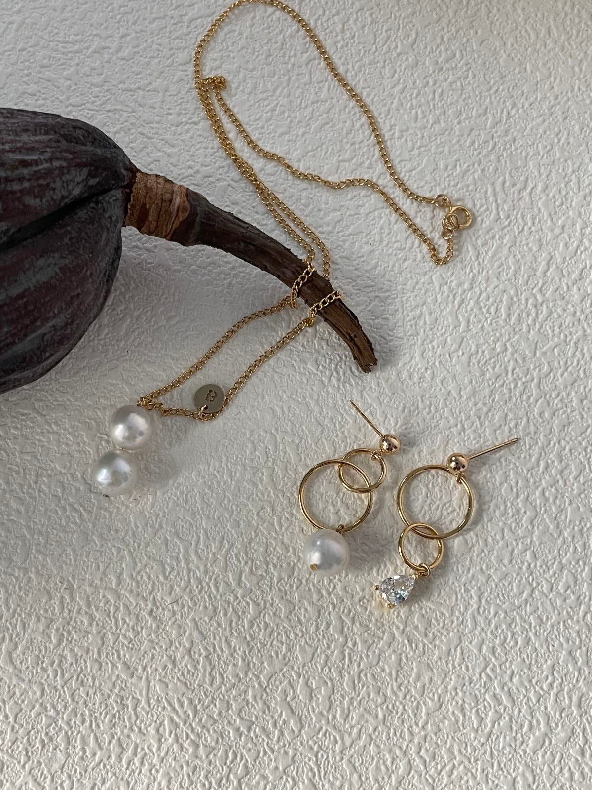 Asymmetric Pearl and Sparkling Zirconia Earrings